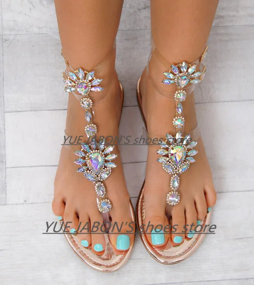 Shoes flat pearl sandals comfortable string bead beach slippers casualSPECIFICATIONSDepartment Name: ADULTBrand Name: Yue JabonModel Number: 11752Side Vamp Type: OpenBack Counter Type: Ankle StrapStyle: fashionFashion Element: String BDMEwomenstorenull