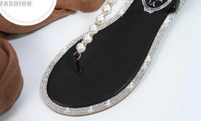 Shoes flat pearl sandals comfortable string bead beach slippers casualSPECIFICATIONSDepartment Name: ADULTBrand Name: Yue JabonModel Number: 11752Side Vamp Type: OpenBack Counter Type: Ankle StrapStyle: fashionFashion Element: String BDMEwomenstorenull