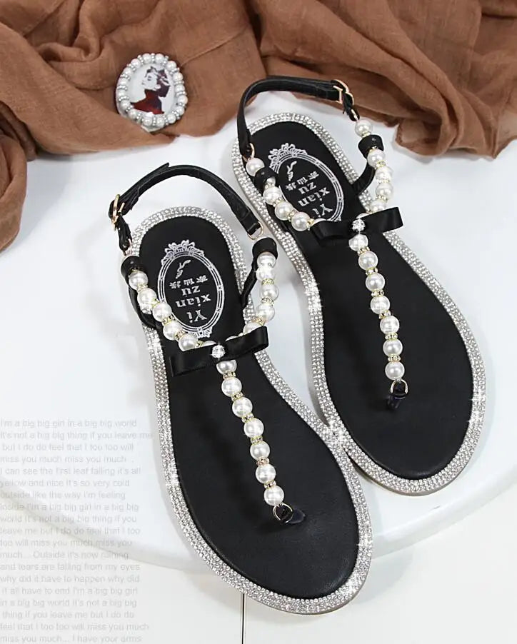 Shoes flat pearl sandals comfortable string bead beach slippers casualSPECIFICATIONSDepartment Name: ADULTBrand Name: Yue JabonModel Number: 11752Side Vamp Type: OpenBack Counter Type: Ankle StrapStyle: fashionFashion Element: String BDMEwomenstorenull