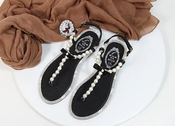 Shoes flat pearl sandals comfortable string bead beach slippers casualSPECIFICATIONSDepartment Name: ADULTBrand Name: Yue JabonModel Number: 11752Side Vamp Type: OpenBack Counter Type: Ankle StrapStyle: fashionFashion Element: String BDMEwomenstorenull