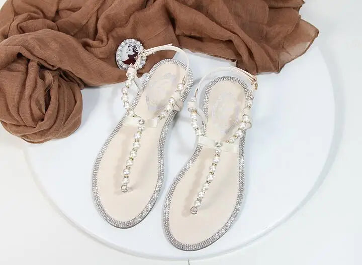 Shoes flat pearl sandals comfortable string bead beach slippers casualSPECIFICATIONSDepartment Name: ADULTBrand Name: Yue JabonModel Number: 11752Side Vamp Type: OpenBack Counter Type: Ankle StrapStyle: fashionFashion Element: String BDMEwomenstorenull