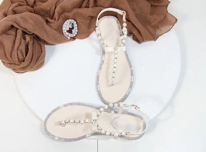 Shoes flat pearl sandals comfortable string bead beach slippers casualSPECIFICATIONSDepartment Name: ADULTBrand Name: Yue JabonModel Number: 11752Side Vamp Type: OpenBack Counter Type: Ankle StrapStyle: fashionFashion Element: String BDMEwomenstorenull