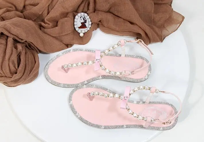 Shoes flat pearl sandals comfortable string bead beach slippers casualSPECIFICATIONSDepartment Name: ADULTBrand Name: Yue JabonModel Number: 11752Side Vamp Type: OpenBack Counter Type: Ankle StrapStyle: fashionFashion Element: String BDMEwomenstorenull