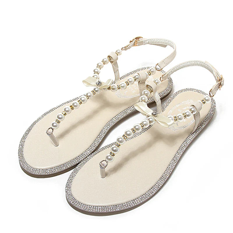 Shoes flat pearl sandals comfortable string bead beach slippers casualSPECIFICATIONSDepartment Name: ADULTBrand Name: Yue JabonModel Number: 11752Side Vamp Type: OpenBack Counter Type: Ankle StrapStyle: fashionFashion Element: String BDMEwomenstorenull