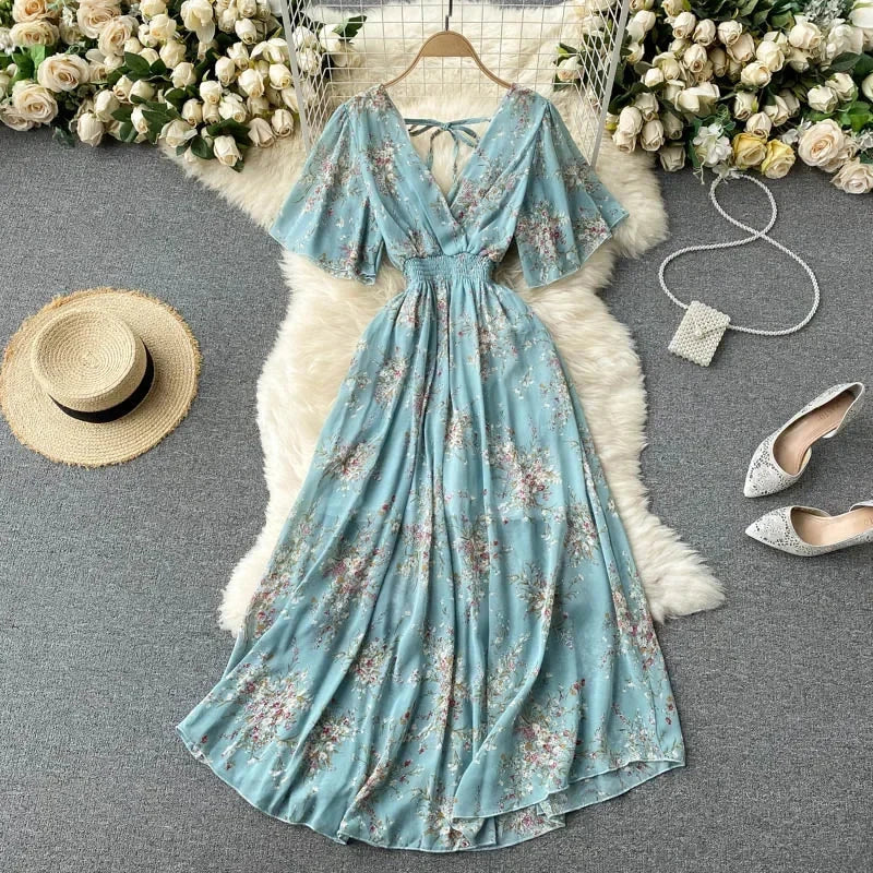 Floral Print Ruffle Chiffon Elegant Midi Dress A-line V Neck Beach VacSPECIFICATIONSBrand Name: unidanceElasticity: Non StrechSleeve Style: regularFabric Type: POLYESTERHign-concerned Chemical: NonePattern Type: PrintFit Type: SlimSilhDMEwomenstorenull