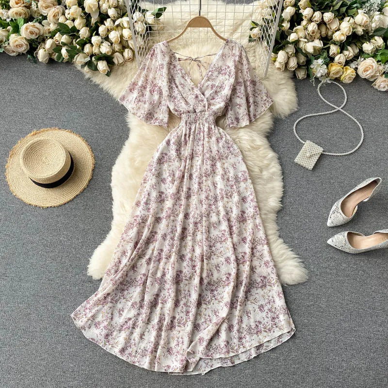 Floral Print Ruffle Chiffon Elegant Midi Dress A-line V Neck Beach VacSPECIFICATIONSBrand Name: unidanceElasticity: Non StrechSleeve Style: regularFabric Type: POLYESTERHign-concerned Chemical: NonePattern Type: PrintFit Type: SlimSilhDMEwomenstorenull