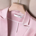 Slim waist women's jacket blazer with notched collar and cropped sleeves.