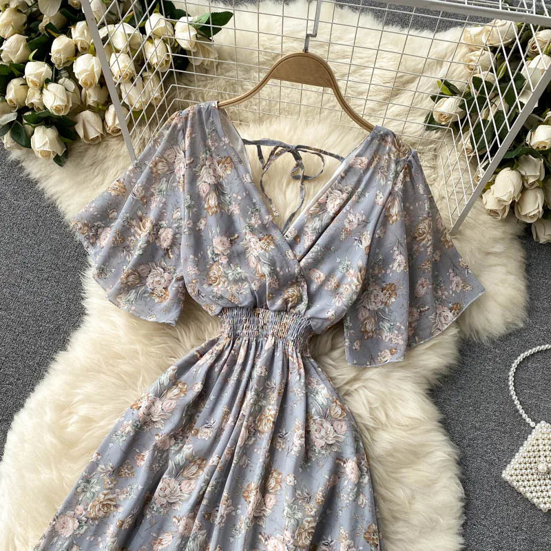 Floral Print Ruffle Chiffon Elegant Midi Dress A-line V Neck Beach VacSPECIFICATIONSBrand Name: unidanceElasticity: Non StrechSleeve Style: regularFabric Type: POLYESTERHign-concerned Chemical: NonePattern Type: PrintFit Type: SlimSilhDMEwomenstorenull