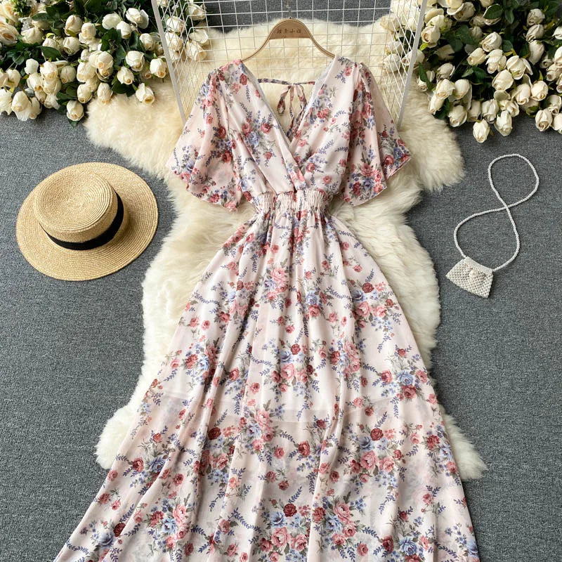 Floral Print Ruffle Chiffon Elegant Midi Dress A-line V Neck Beach VacSPECIFICATIONSBrand Name: unidanceElasticity: Non StrechSleeve Style: regularFabric Type: POLYESTERHign-concerned Chemical: NonePattern Type: PrintFit Type: SlimSilhDMEwomenstorenull