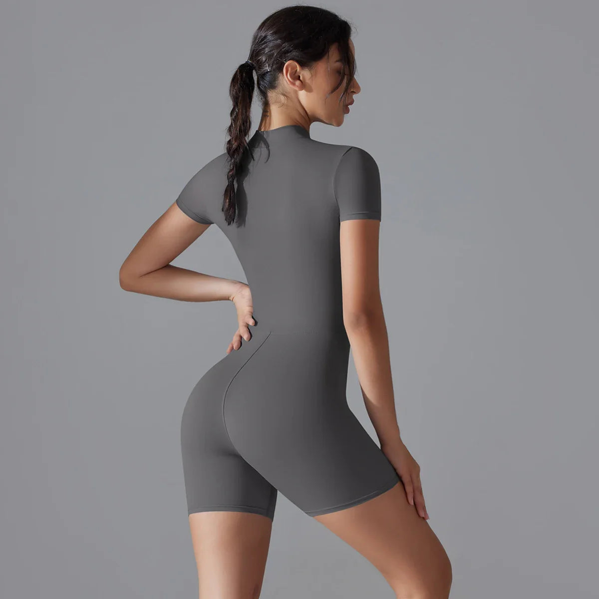 Rompers One-Piece Suit Zipper Short Sleeve Push Up Workout Clothes BodSPECIFICATIONSBrand Name: RooftrellenAge: MIDDLE AGEMaterial: SPANDEXMaterial: NylonElasticity: High StrecthFabric Type: NylonStyle: Office LadyHign-concerned ChemicDMEwomenstorenull