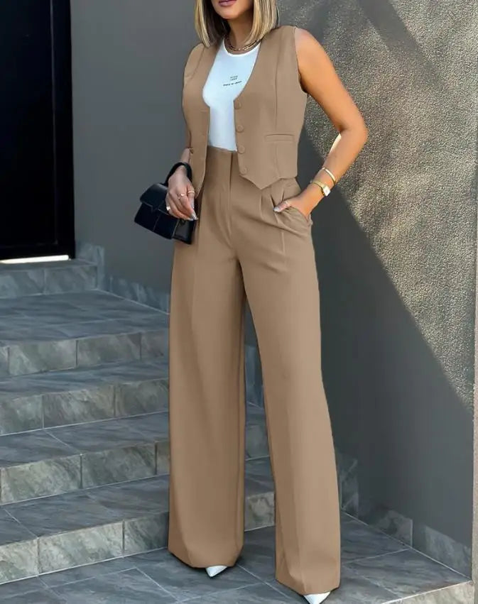 Women's casual slim notched blazer and waistcoat set with high-waisted ankle-length pants in solid color.