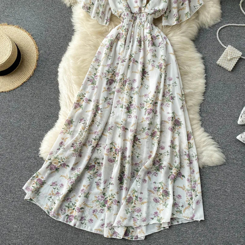 Floral Print Ruffle Chiffon Elegant Midi Dress A-line V Neck Beach VacSPECIFICATIONSBrand Name: unidanceElasticity: Non StrechSleeve Style: regularFabric Type: POLYESTERHign-concerned Chemical: NonePattern Type: PrintFit Type: SlimSilhDMEwomenstorenull