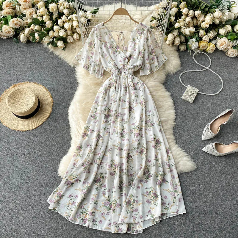 Floral Print Ruffle Chiffon Elegant Midi Dress A-line V Neck Beach VacSPECIFICATIONSBrand Name: unidanceElasticity: Non StrechSleeve Style: regularFabric Type: POLYESTERHign-concerned Chemical: NonePattern Type: PrintFit Type: SlimSilhDMEwomenstorenull