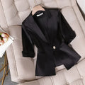 Slim black waist blazer with cropped sleeves for women.