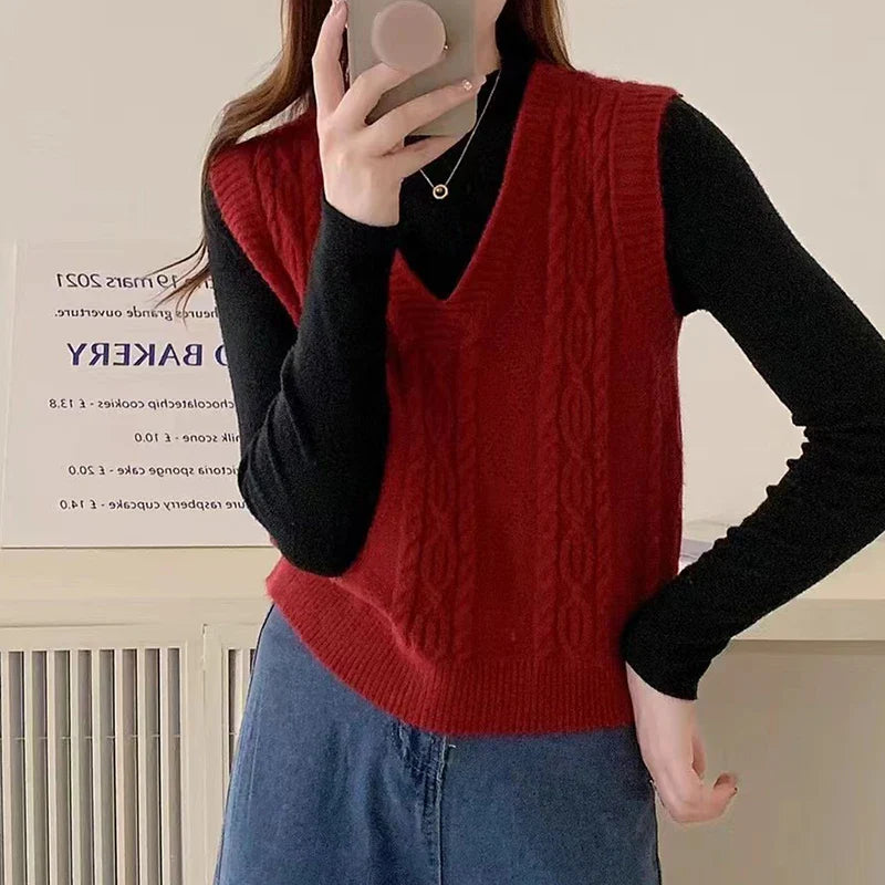 V-neck Sweater Vest Solid Sleeveless Preppy Style Sweet Knitted Vest FSPECIFICATIONSBrand Name: HeliarStyle: CasualCraft of Weaving: KnitAge: MIDDLE AGEOrigin: Mainland ChinaCN: GuangdongSeason: Autumn/WinterThickness: StandardDecoratiDMEwomenstorenull