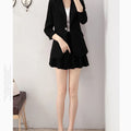 Women's elegant 2-piece suit with unlined blazer and A-line skirt.