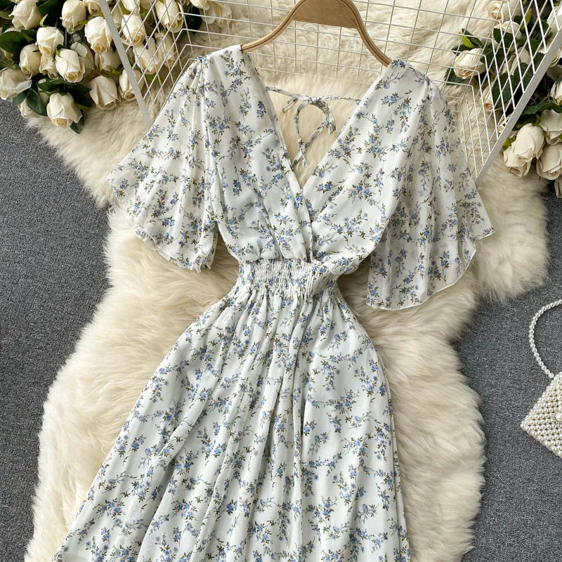 Floral Print Ruffle Chiffon Elegant Midi Dress A-line V Neck Beach VacSPECIFICATIONSBrand Name: unidanceElasticity: Non StrechSleeve Style: regularFabric Type: POLYESTERHign-concerned Chemical: NonePattern Type: PrintFit Type: SlimSilhDMEwomenstorenull