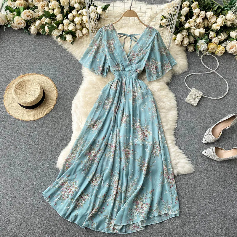 Floral Print Ruffle Chiffon Elegant Midi Dress A-line V Neck Beach VacSPECIFICATIONSBrand Name: unidanceElasticity: Non StrechSleeve Style: regularFabric Type: POLYESTERHign-concerned Chemical: NonePattern Type: PrintFit Type: SlimSilhDMEwomenstorenull