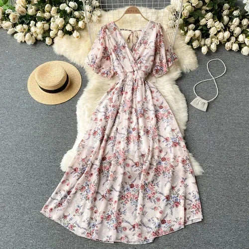 Floral Print Ruffle Chiffon Elegant Midi Dress A-line V Neck Beach VacSPECIFICATIONSBrand Name: unidanceElasticity: Non StrechSleeve Style: regularFabric Type: POLYESTERHign-concerned Chemical: NonePattern Type: PrintFit Type: SlimSilhDMEwomenstorenull