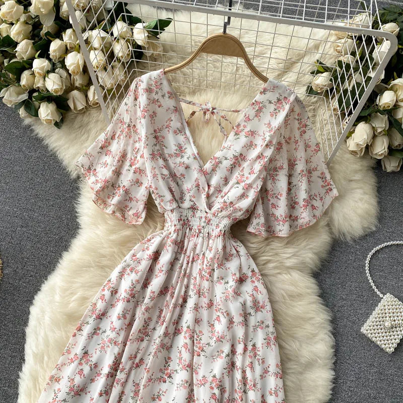 Floral Print Ruffle Chiffon Elegant Midi Dress A-line V Neck Beach VacSPECIFICATIONSBrand Name: unidanceElasticity: Non StrechSleeve Style: regularFabric Type: POLYESTERHign-concerned Chemical: NonePattern Type: PrintFit Type: SlimSilhDMEwomenstorenull