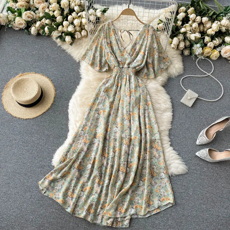 Floral Print Ruffle Chiffon Elegant Midi Dress A-line V Neck Beach VacSPECIFICATIONSBrand Name: unidanceElasticity: Non StrechSleeve Style: regularFabric Type: POLYESTERHign-concerned Chemical: NonePattern Type: PrintFit Type: SlimSilhDMEwomenstorenull