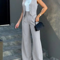 Casual slim notched blazer pant set for women with waistcoat design.