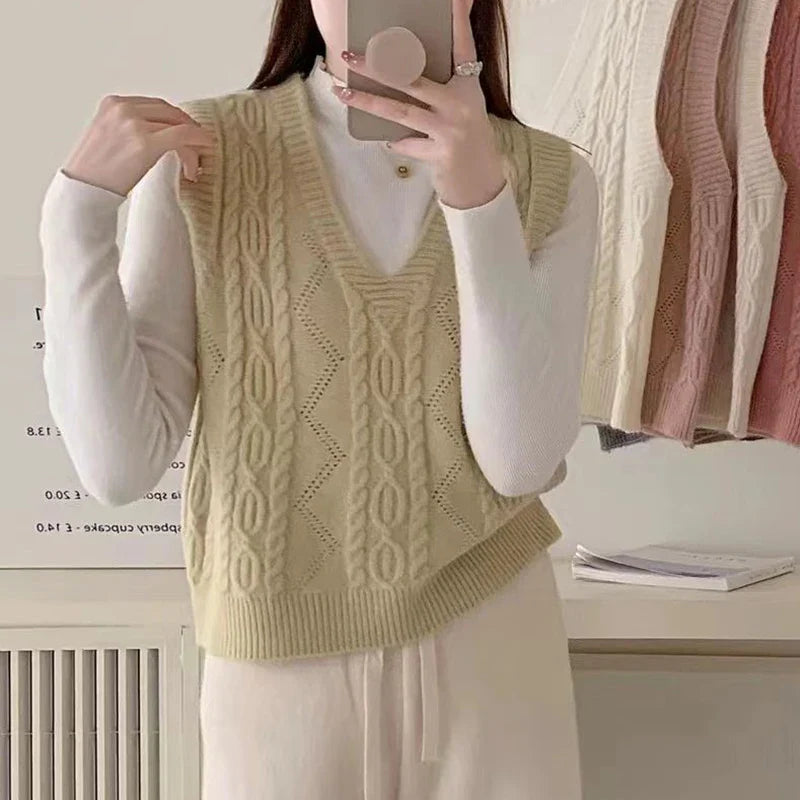 V-neck Sweater Vest Solid Sleeveless Preppy Style Sweet Knitted Vest FSPECIFICATIONSBrand Name: HeliarStyle: CasualCraft of Weaving: KnitAge: MIDDLE AGEOrigin: Mainland ChinaCN: GuangdongSeason: Autumn/WinterThickness: StandardDecoratiDMEwomenstorenull