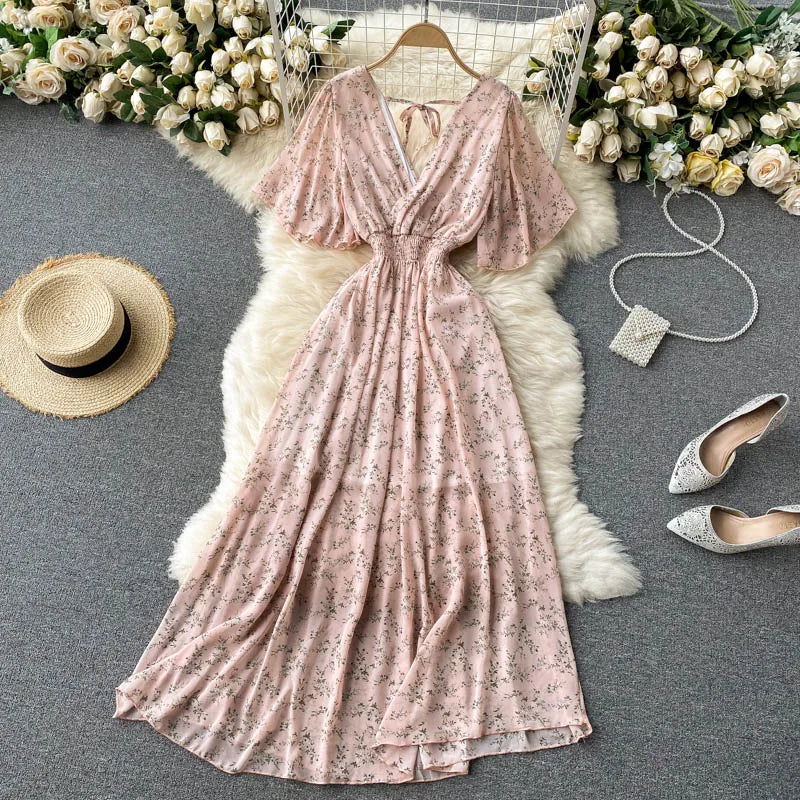 Floral Print Ruffle Chiffon Elegant Midi Dress A-line V Neck Beach VacSPECIFICATIONSBrand Name: unidanceElasticity: Non StrechSleeve Style: regularFabric Type: POLYESTERHign-concerned Chemical: NonePattern Type: PrintFit Type: SlimSilhDMEwomenstorenull