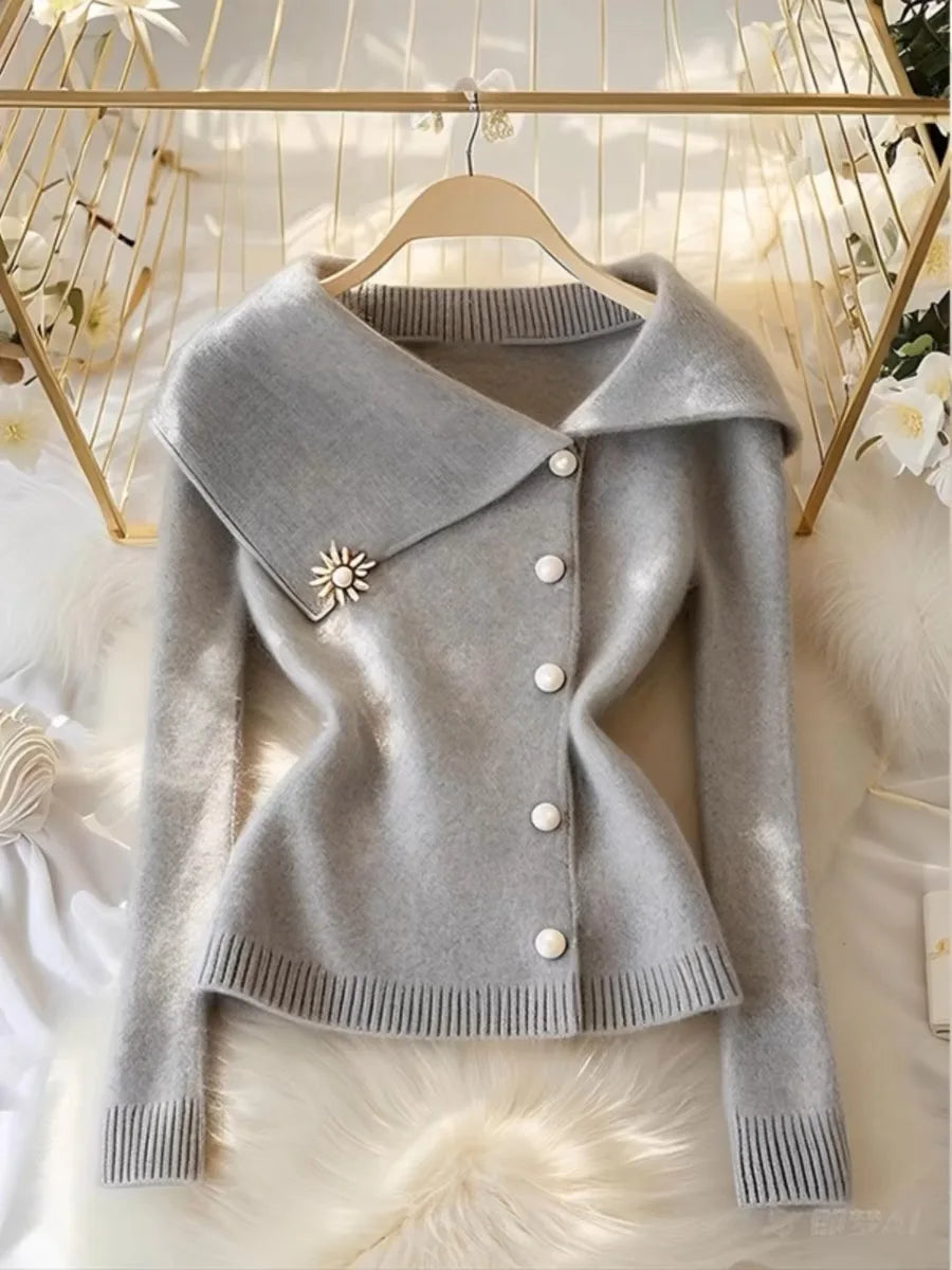 Chic Button Soft Wool Sweaters Women's Clothing Elegant Turn-down CollSPECIFICATIONSBrand Name: NoEnName_NullElasticity: Medium StrecthSleeve Style: regularHign-concerned Chemical: NoneMaterial Composition: knittedPattern Type: SolidFiDMEwomenstorenull