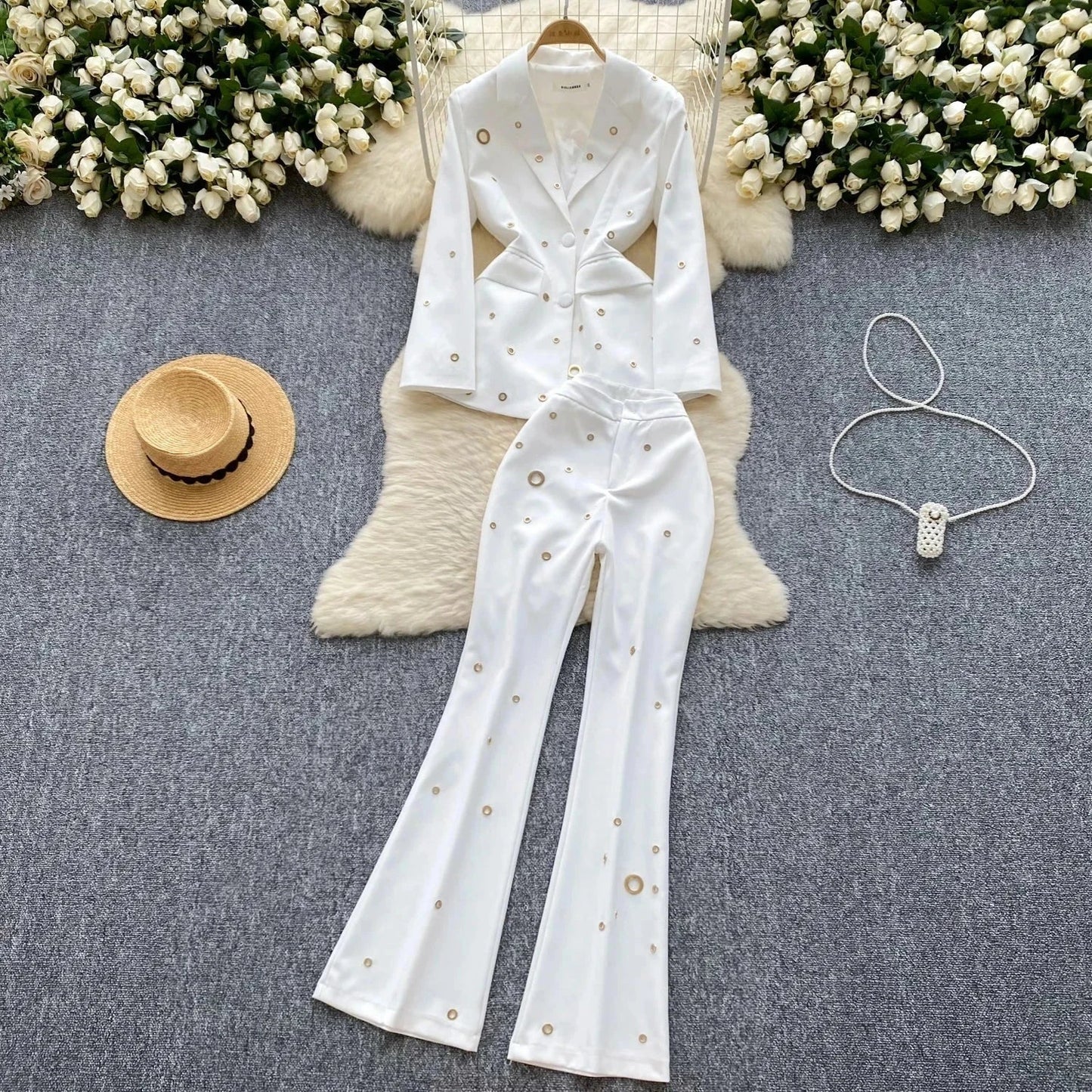 White metal buckle single breasted blazer and high waisted wide leg pants two piece suit.