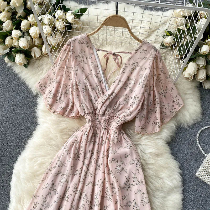 Floral Print Ruffle Chiffon Elegant Midi Dress A-line V Neck Beach VacSPECIFICATIONSBrand Name: unidanceElasticity: Non StrechSleeve Style: regularFabric Type: POLYESTERHign-concerned Chemical: NonePattern Type: PrintFit Type: SlimSilhDMEwomenstorenull