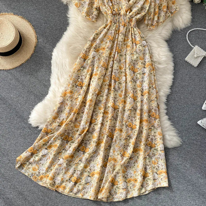 Floral Print Ruffle Chiffon Elegant Midi Dress A-line V Neck Beach VacSPECIFICATIONSBrand Name: unidanceElasticity: Non StrechSleeve Style: regularFabric Type: POLYESTERHign-concerned Chemical: NonePattern Type: PrintFit Type: SlimSilhDMEwomenstorenull