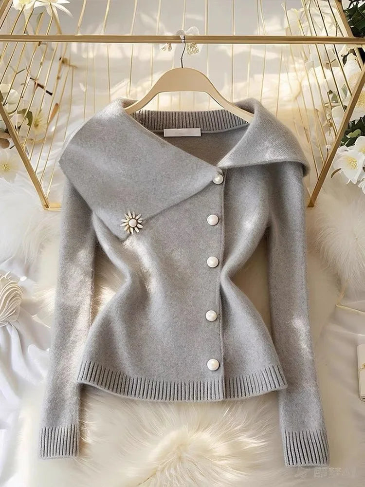 Chic Button Soft Wool Sweaters Women's Clothing Elegant Turn-down CollSPECIFICATIONSBrand Name: NoEnName_NullElasticity: Medium StrecthSleeve Style: regularHign-concerned Chemical: NoneMaterial Composition: knittedPattern Type: SolidFiDMEwomenstorenull