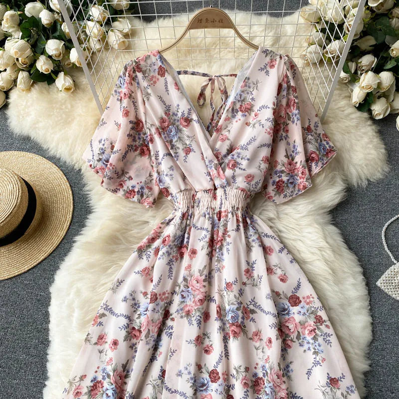 Floral Print Ruffle Chiffon Elegant Midi Dress A-line V Neck Beach VacSPECIFICATIONSBrand Name: unidanceElasticity: Non StrechSleeve Style: regularFabric Type: POLYESTERHign-concerned Chemical: NonePattern Type: PrintFit Type: SlimSilhDMEwomenstorenull