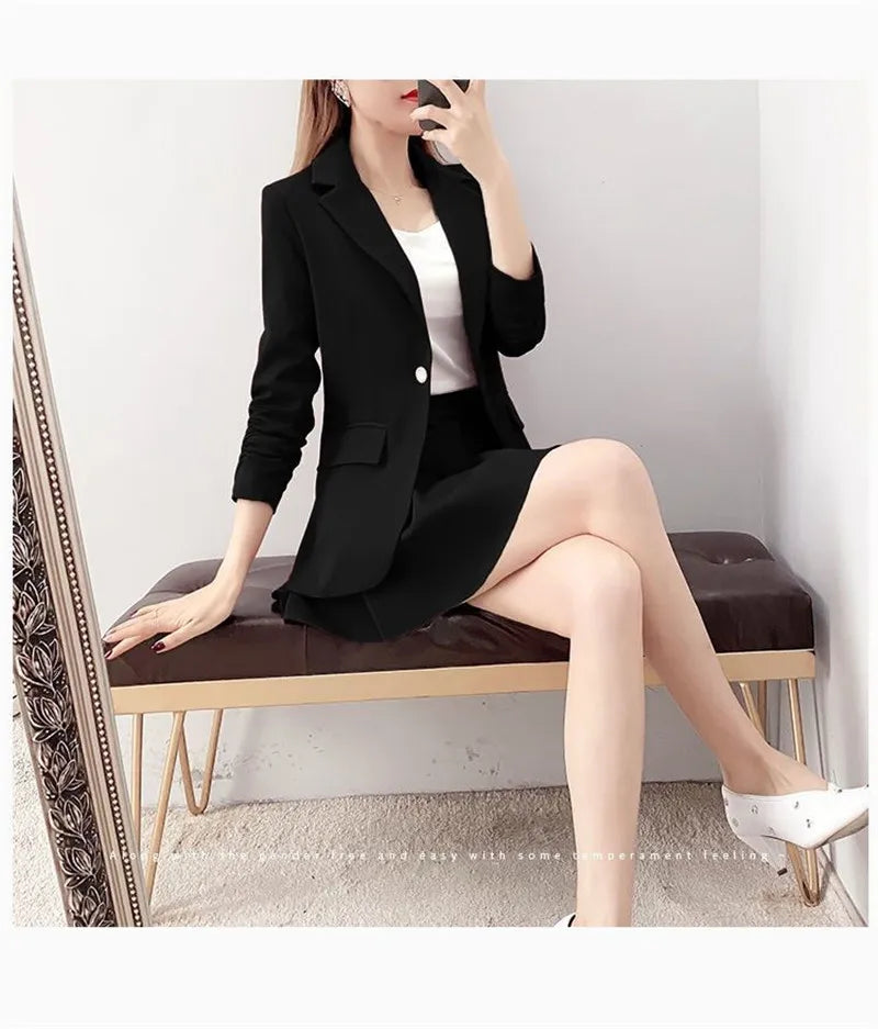 Elegant two-piece women's suit with unlined blazer and A-line skirt.