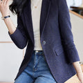 Elegant long-sleeve women's blazer with turn-down collar and single-button closure