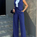 Women's blue sleeveless blazer and high-waist pant set, paired with a white top, showcasing a chic office lady style.