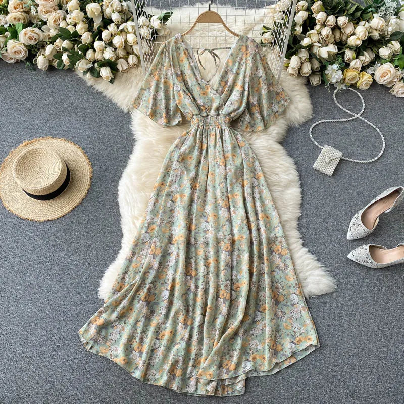 Floral Print Ruffle Chiffon Elegant Midi Dress A-line V Neck Beach VacSPECIFICATIONSBrand Name: unidanceElasticity: Non StrechSleeve Style: regularFabric Type: POLYESTERHign-concerned Chemical: NonePattern Type: PrintFit Type: SlimSilhDMEwomenstorenull