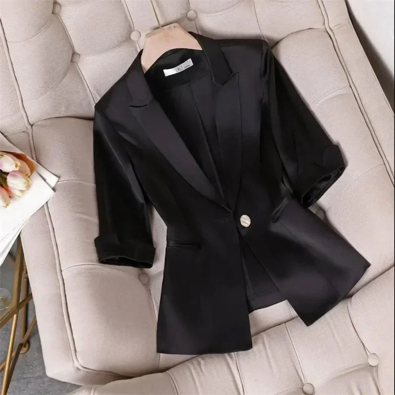 Slim waist jacket blazer with cropped sleeves for women, single breasted, notched collar, black color.