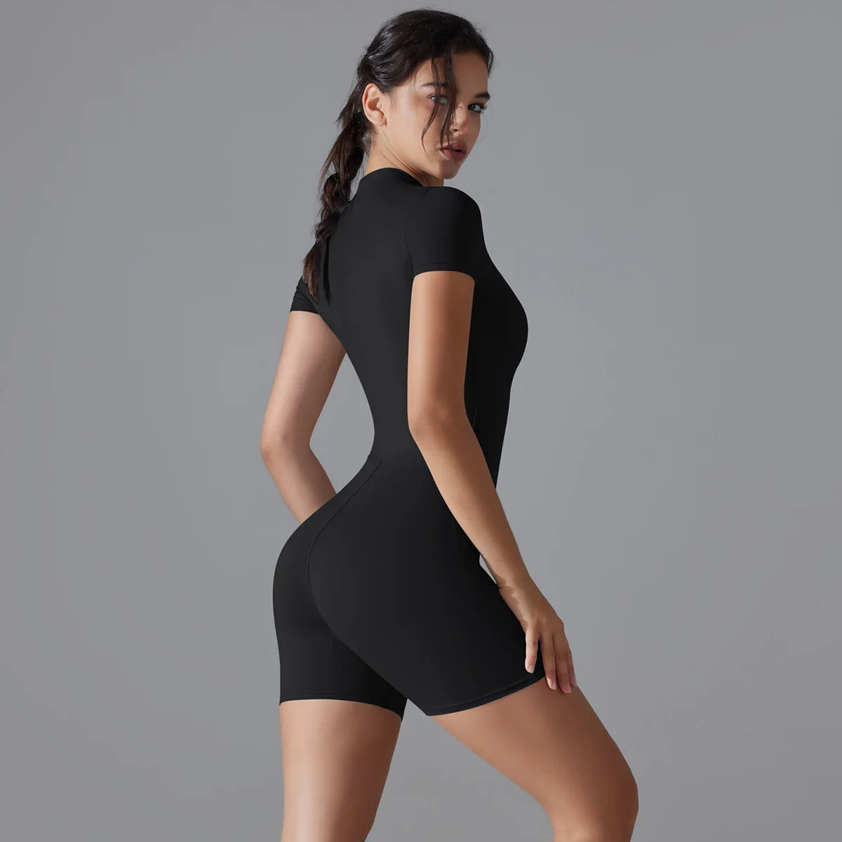 Rompers One-Piece Suit Zipper Short Sleeve Push Up Workout Clothes BodSPECIFICATIONSBrand Name: RooftrellenAge: MIDDLE AGEMaterial: SPANDEXMaterial: NylonElasticity: High StrecthFabric Type: NylonStyle: Office LadyHign-concerned ChemicDMEwomenstorenull