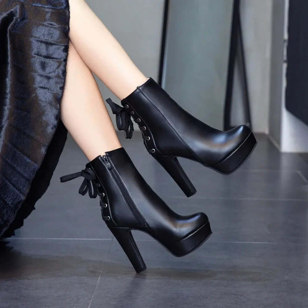 Fashion Ankle Boots Women Platform High Heels Short Boot Lace-up BlackSPECIFICATIONSBrand Name: ZOGEERBoot Type: basicShaft Material: PUOutsole Material: RUBBERUpper Material: PUHign-concerned Chemical: NoneOrigin: Mainland ChinaCN: SiDMEwomenstorenull