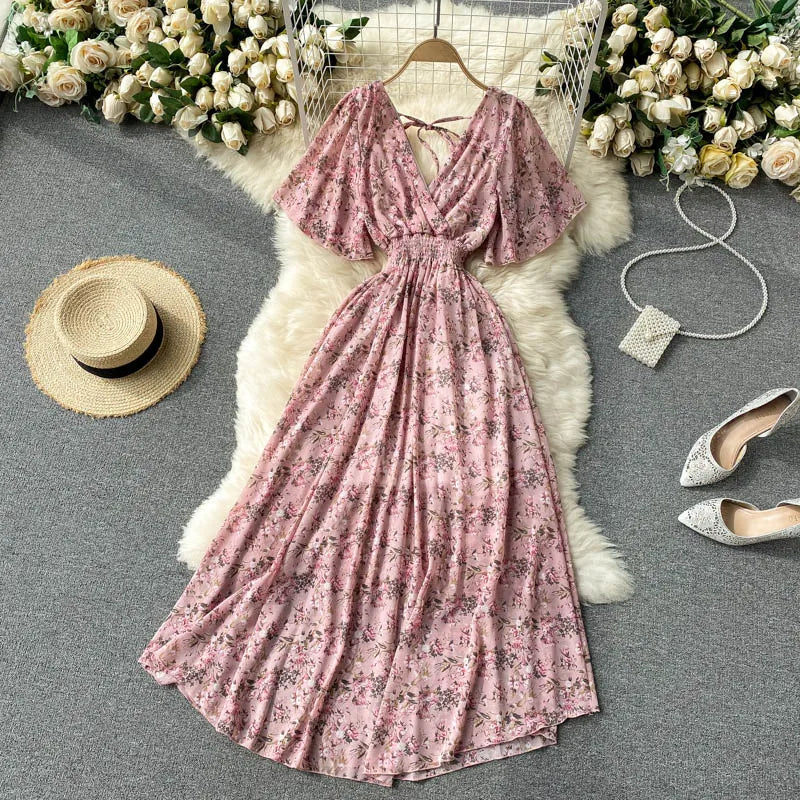 Floral Print Ruffle Chiffon Elegant Midi Dress A-line V Neck Beach VacSPECIFICATIONSBrand Name: unidanceElasticity: Non StrechSleeve Style: regularFabric Type: POLYESTERHign-concerned Chemical: NonePattern Type: PrintFit Type: SlimSilhDMEwomenstorenull