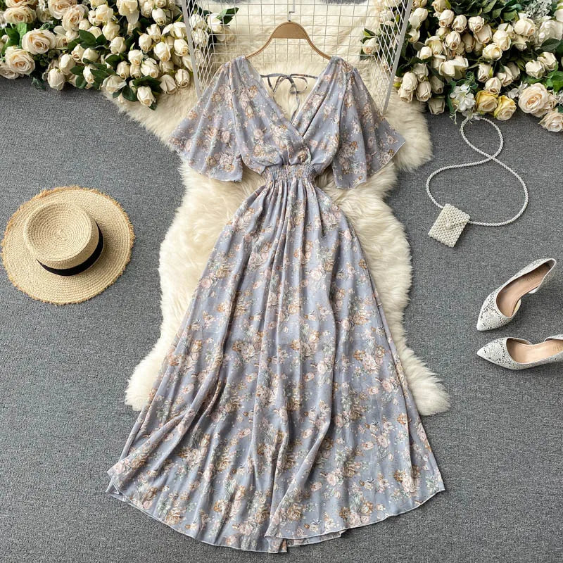 Floral Print Ruffle Chiffon Elegant Midi Dress A-line V Neck Beach VacSPECIFICATIONSBrand Name: unidanceElasticity: Non StrechSleeve Style: regularFabric Type: POLYESTERHign-concerned Chemical: NonePattern Type: PrintFit Type: SlimSilhDMEwomenstorenull