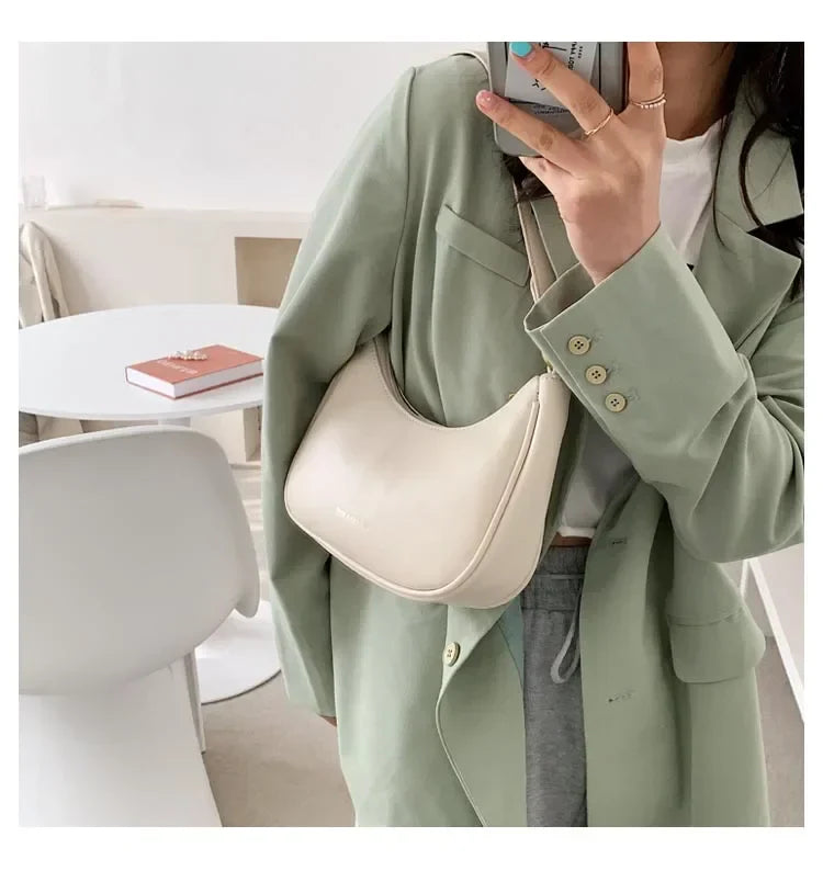 Underarm Bag for Women's Summer New Trendy and High end Crossbody Bag SPECIFICATIONSBrand Name: NoEnName_NullHign-concerned Chemical: NoneHandbags Type: Shoulder BagsMain Material: PULining Material: POLYESTERShape: BaguettePlace Of OrDMEwomenstorenull