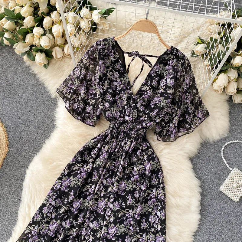 Floral Print Ruffle Chiffon Elegant Midi Dress A-line V Neck Beach VacSPECIFICATIONSBrand Name: unidanceElasticity: Non StrechSleeve Style: regularFabric Type: POLYESTERHign-concerned Chemical: NonePattern Type: PrintFit Type: SlimSilhDMEwomenstorenull