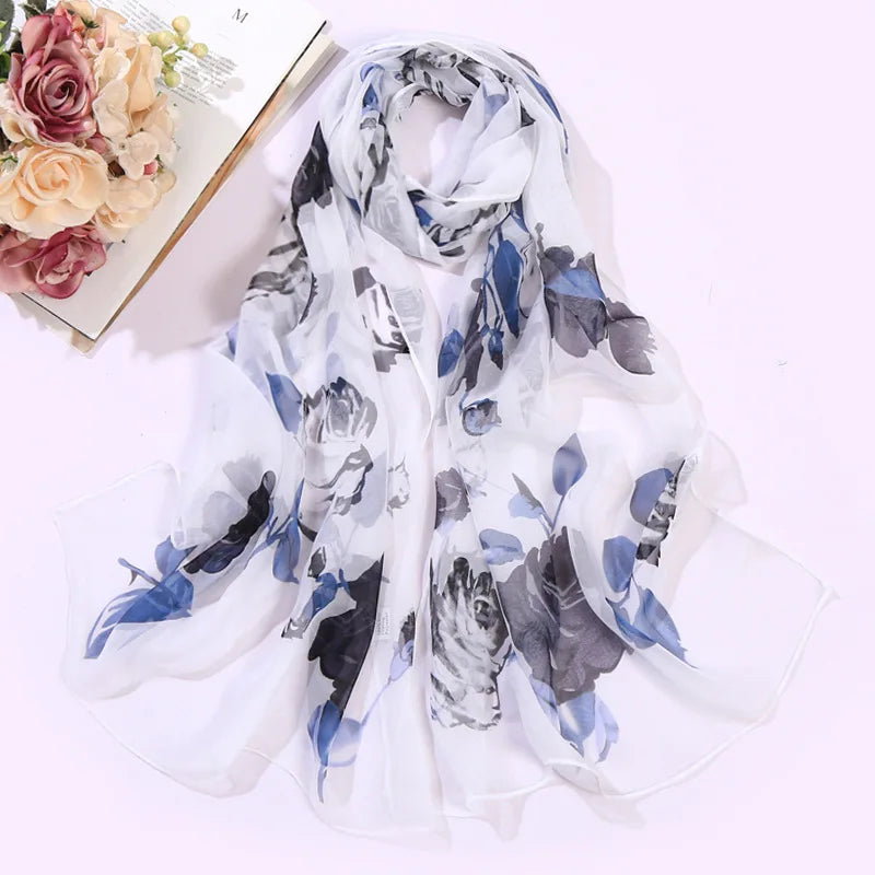 Scarf Women Foulard Shawl Bandana Elegant Beach Sun ProtectionSPECIFICATIONSDepartment Name: ADULTSize: 50*160cm(1cm=0.39in)pattern: RoseApply to season: Spring,Autumn,summerStyle: ElegantColor: Red,Black,Navy blueBrand Name: NDMEwomenstorenull