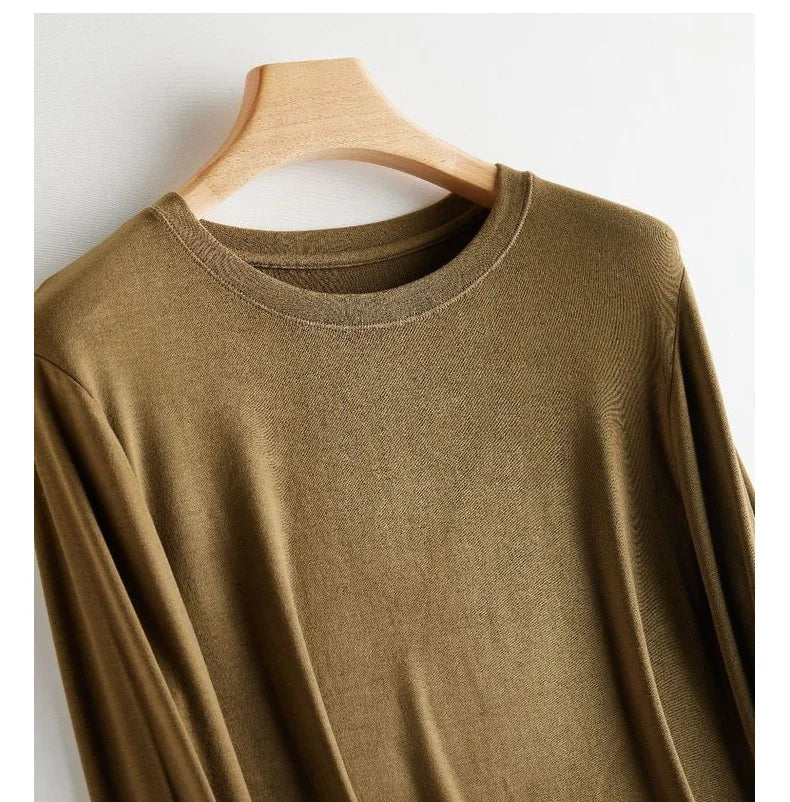 Wool Soft Long Sleeve T-shirts Women Round Neck Slim Fit Basic HeatingSPECIFICATIONSBrand Name: Y DemoStyle: Office LadyAge: MIDDLE AGEOrigin: Mainland ChinaCN: ZhejiangSeason: Autumn/WinterClothing Length: regularDecoration: noneElastDMEwomenstorenull