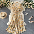 Floral Print Ruffle Chiffon Elegant Midi Dress A-line V Neck Beach VacSPECIFICATIONSBrand Name: unidanceElasticity: Non StrechSleeve Style: regularFabric Type: POLYESTERHign-concerned Chemical: NonePattern Type: PrintFit Type: SlimSilhDMEwomenstorenull