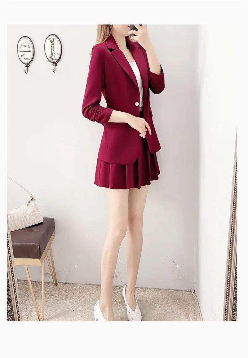 2 piece women's elegant suit with unlined blazer and A-line skirt in red.