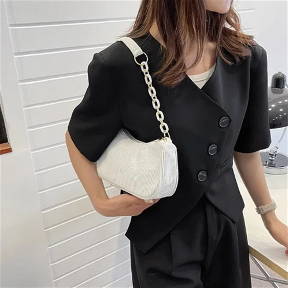 Mini Fashion Women's Shoulder Bag Felt Solid Color Retro Underarm BagsSPECIFICATIONSBrand Name: NoEnName_NullHign-concerned Chemical: NoneHandbags Type: Shoulder BagsMain Material: CorduroyLining Material: COTTONShape: BoxPlace Of OrigDMEwomenstorenull